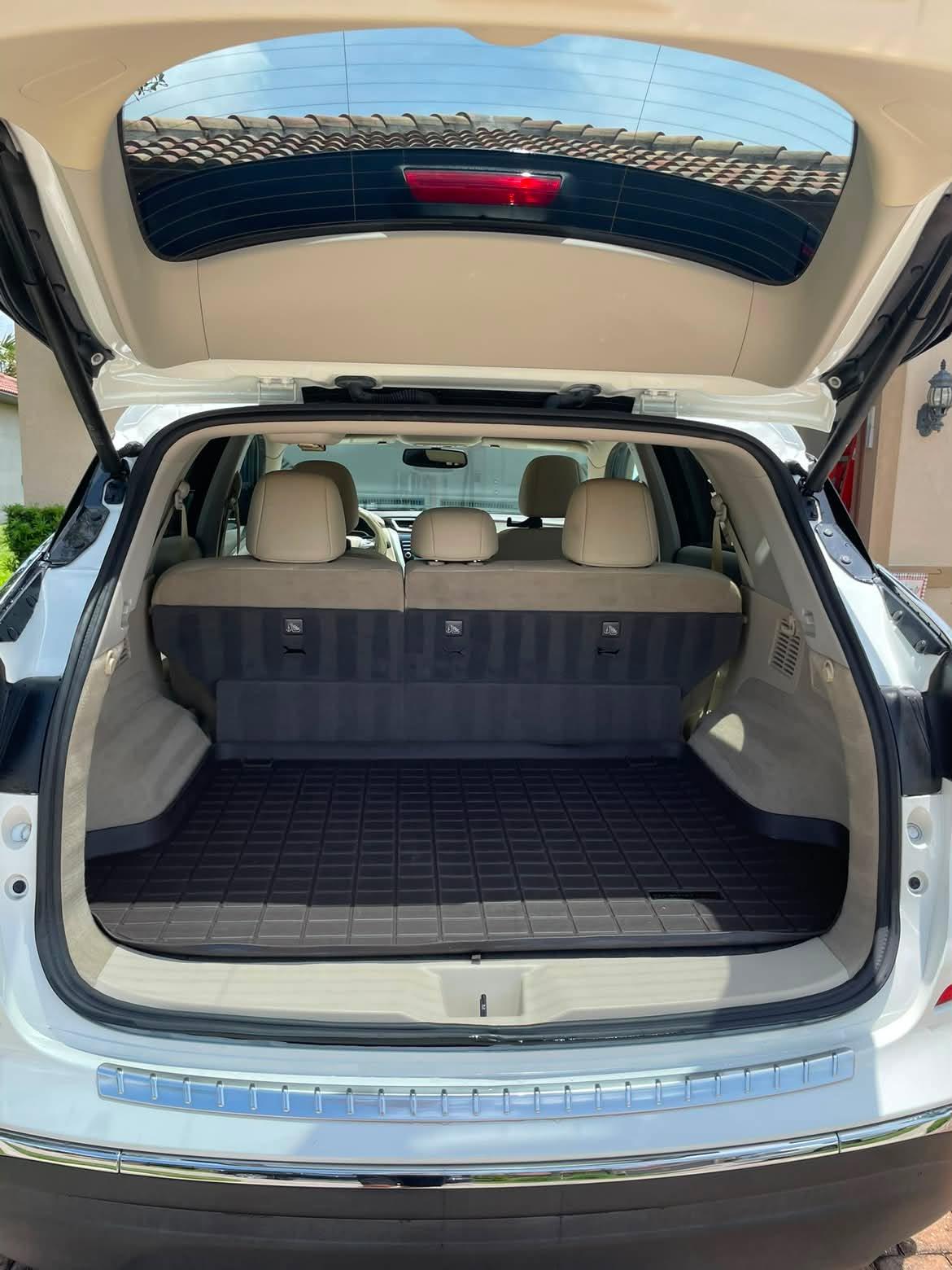 Cleaned SUV cargo area with fresh liner